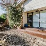 \'Tangerine Gleam\' Cheerful Inner-City Family Abode