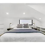 Elegant Loft-Style Apartment Minutes From Beach