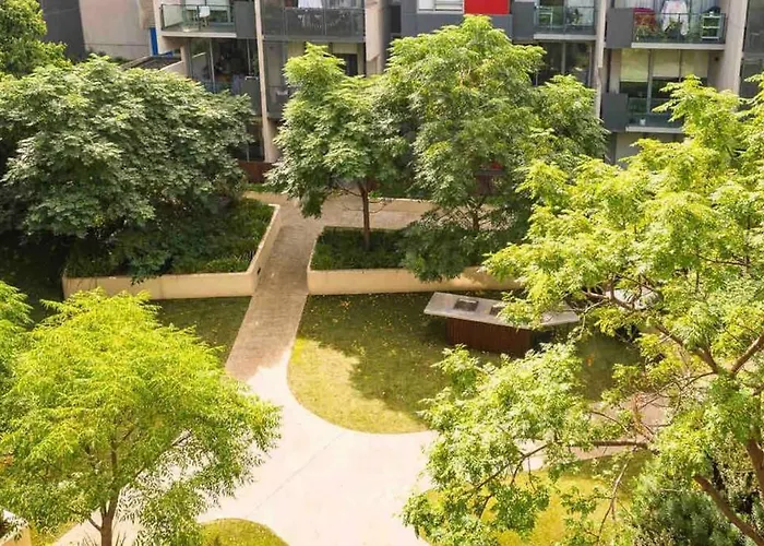 Sunny Balcony Over A Calm Private Garden