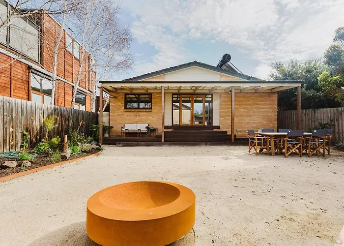 \'Tangerine Gleam\' Cheerful Inner-City Family Abode