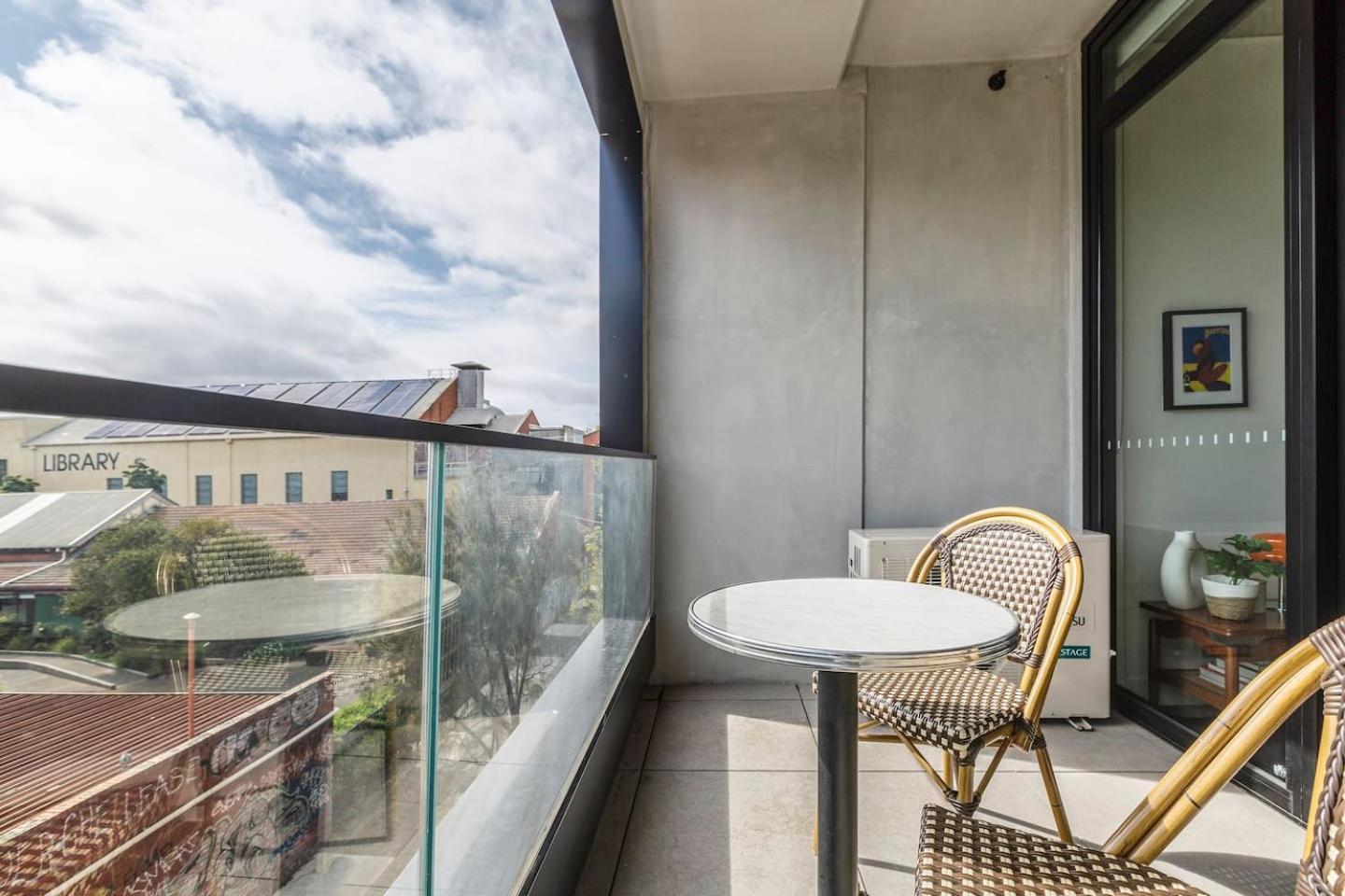 Concrete Junction - Sunny, Industrial Balcony Haven