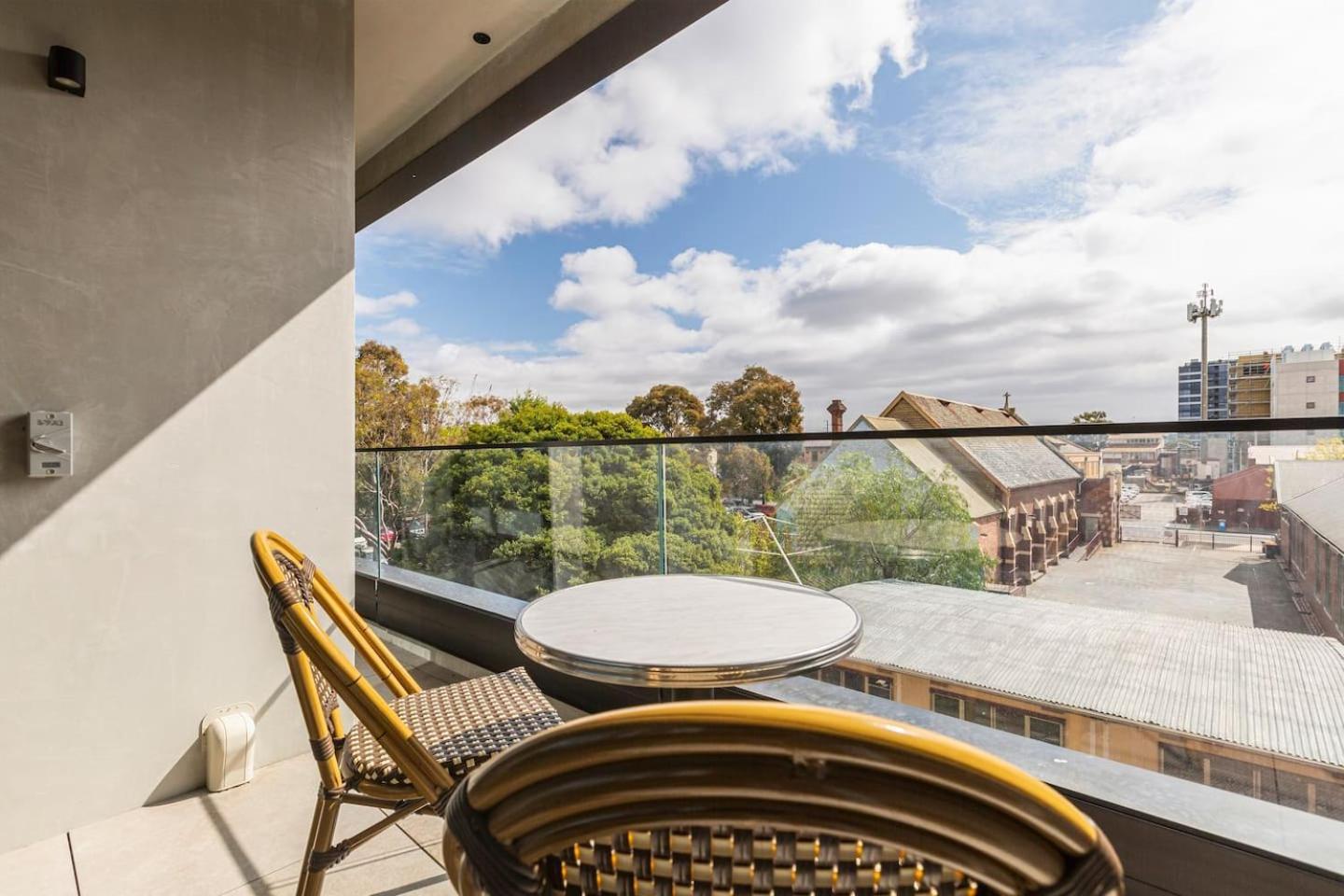 Apartment Concrete Junction - Sunny, Industrial Balcony Haven