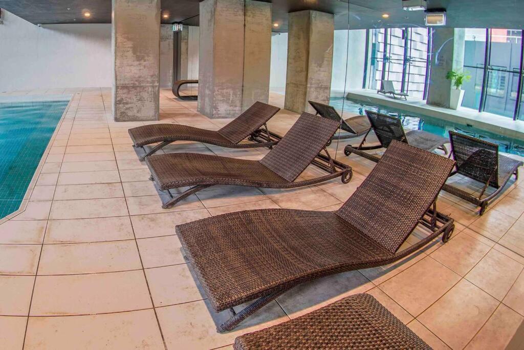 Apartment Location In The Cbd; Pool, Gym, Rockclimbing +7 Other Amenities