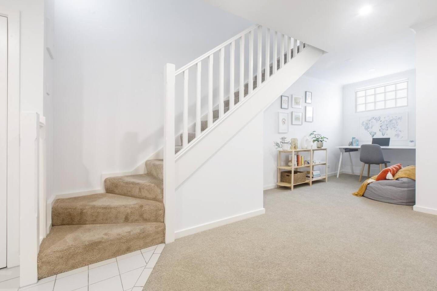 'laidback Lygon' A Two-storey Inner-city Oasis