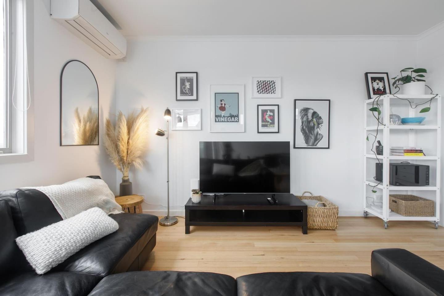 'laidback Lygon' A Two-storey Inner-city Oasis Apartment